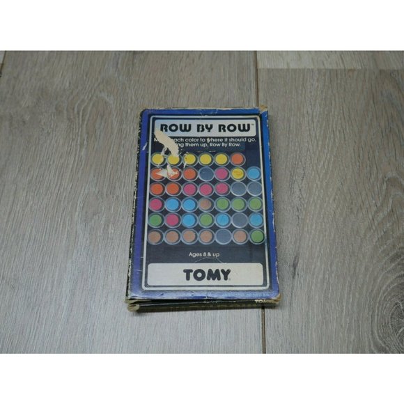 Vintage Tomy Row By Row Handheld 6-inch Game - Picture 1 of 5
